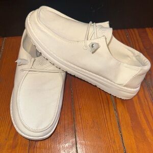 All white Hey Dudes, women’s size 6
